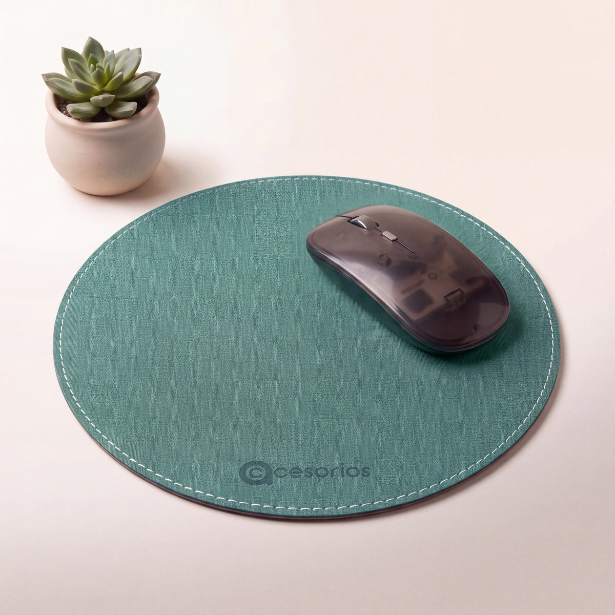 Sage Green round chambray fabric mouse pad 23 cm - on a warm studio background with a modern mouse