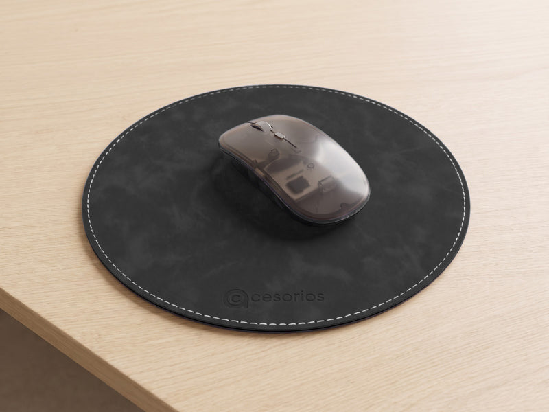 Flat round mouse pad with a white stitched edge, lying completely flat