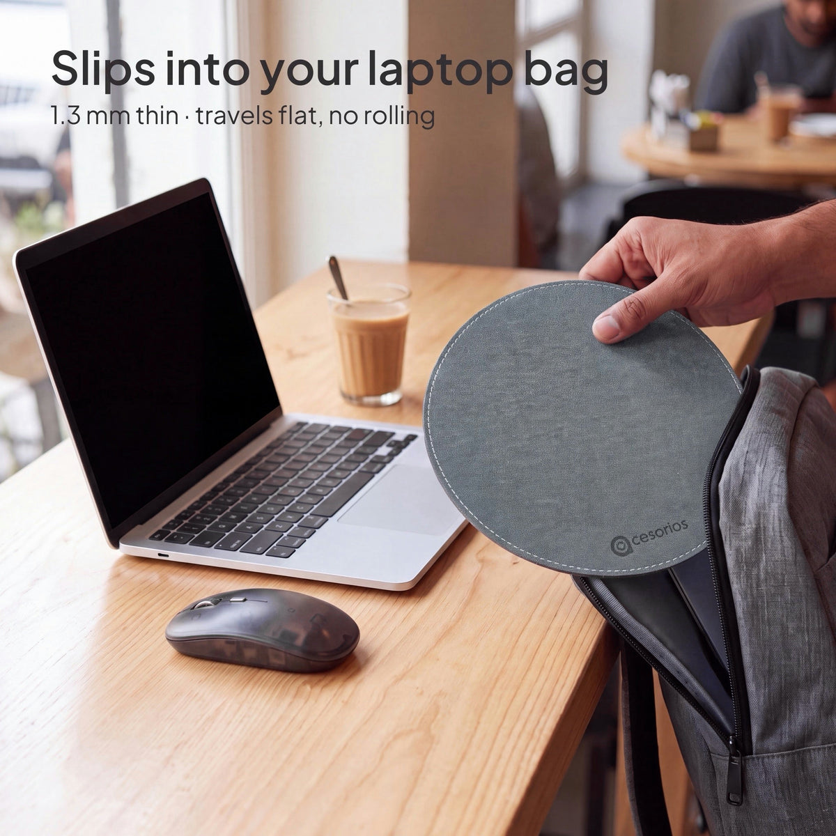 Ash Grey round chambray fabric mouse pad 23 cm - sliding flat out of a laptop bag