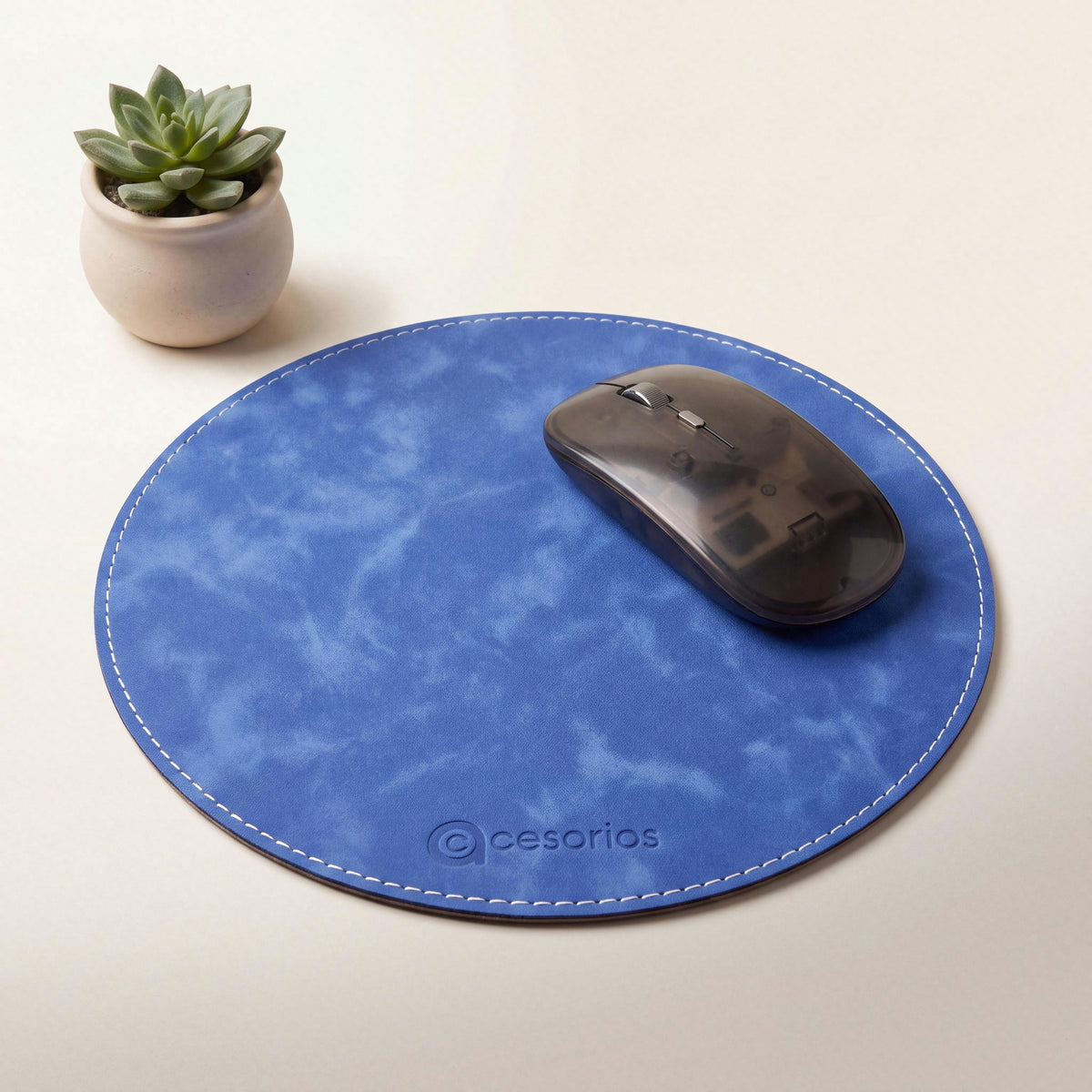 Royal Blue round vegan leather mouse pad 23 cm - on a warm studio background with a modern mouse