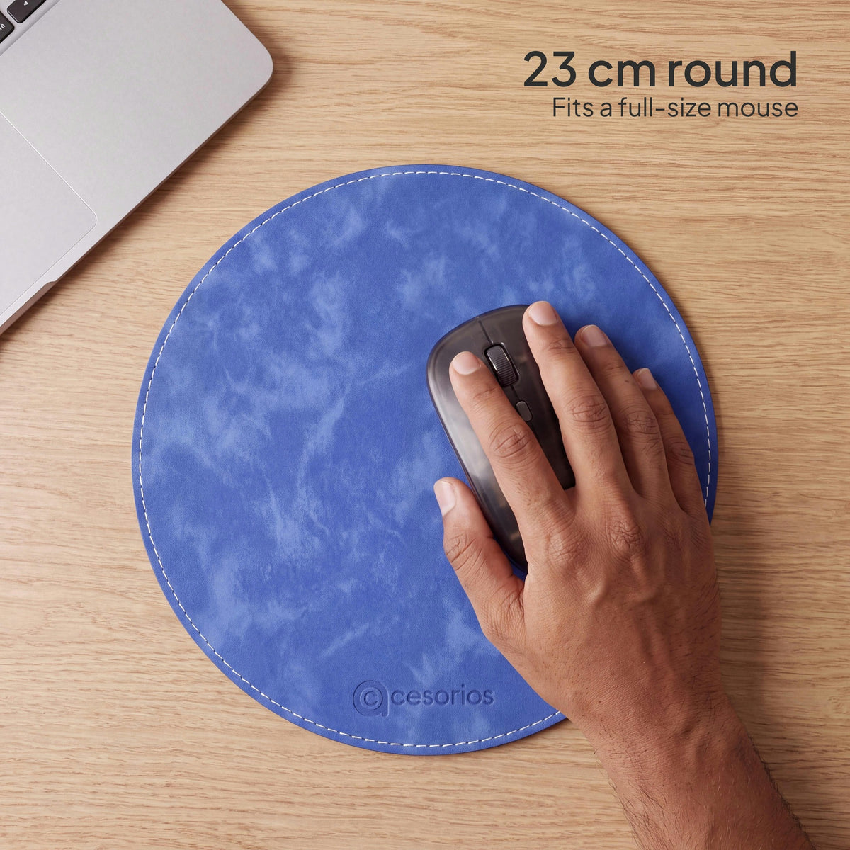 Royal Blue round vegan leather mouse pad 23 cm - hand on mouse showing the 23 cm size