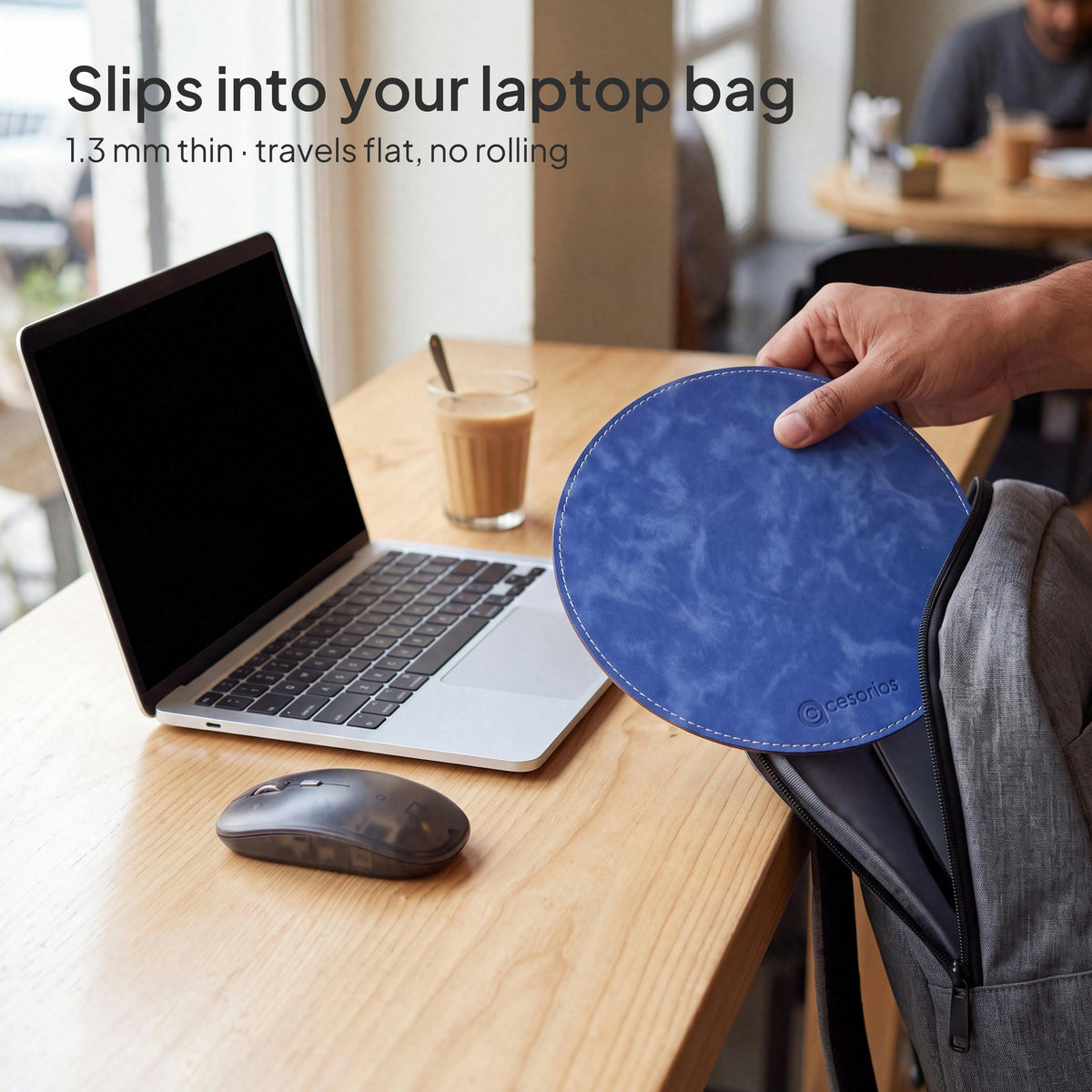 Royal Blue round vegan leather mouse pad 23 cm - sliding flat out of a laptop bag