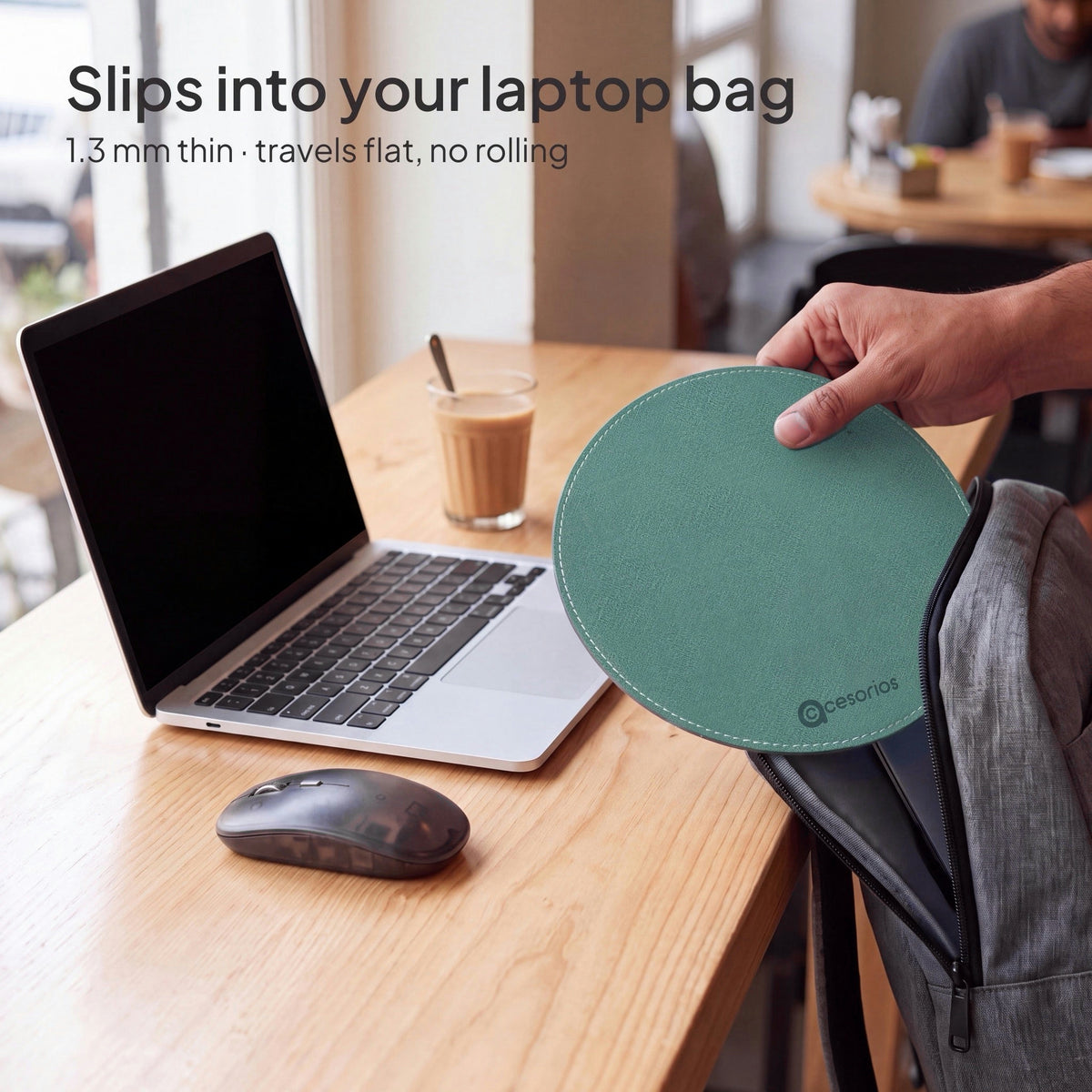 Sage Green round chambray fabric mouse pad 23 cm - sliding flat out of a laptop bag