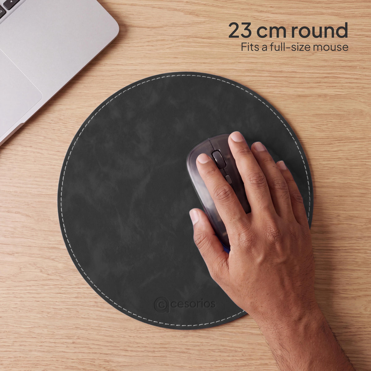 Slate Charcoal round vegan leather mouse pad 23 cm - hand on mouse showing the 23 cm size
