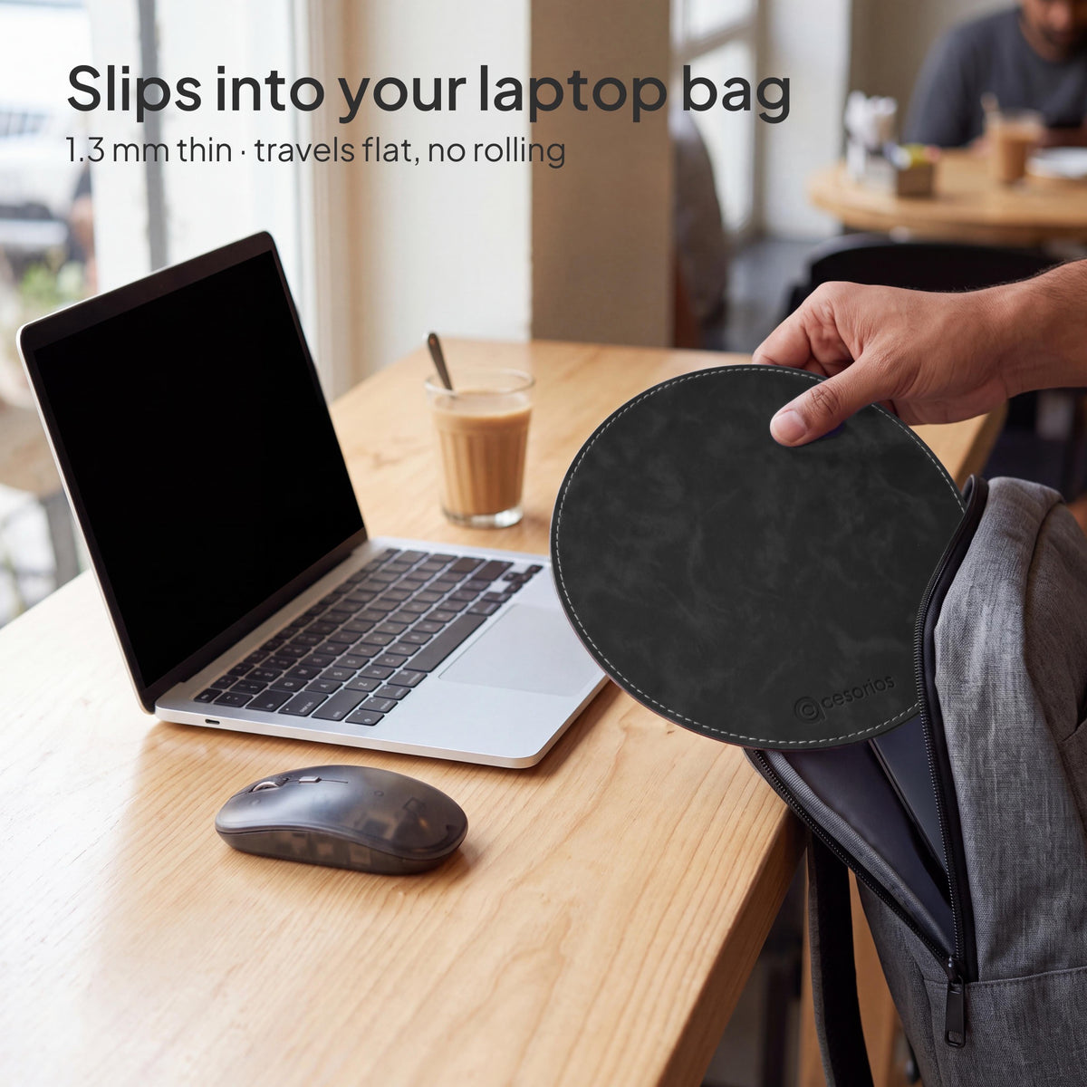 Slate Charcoal round vegan leather mouse pad 23 cm - sliding flat out of a laptop bag