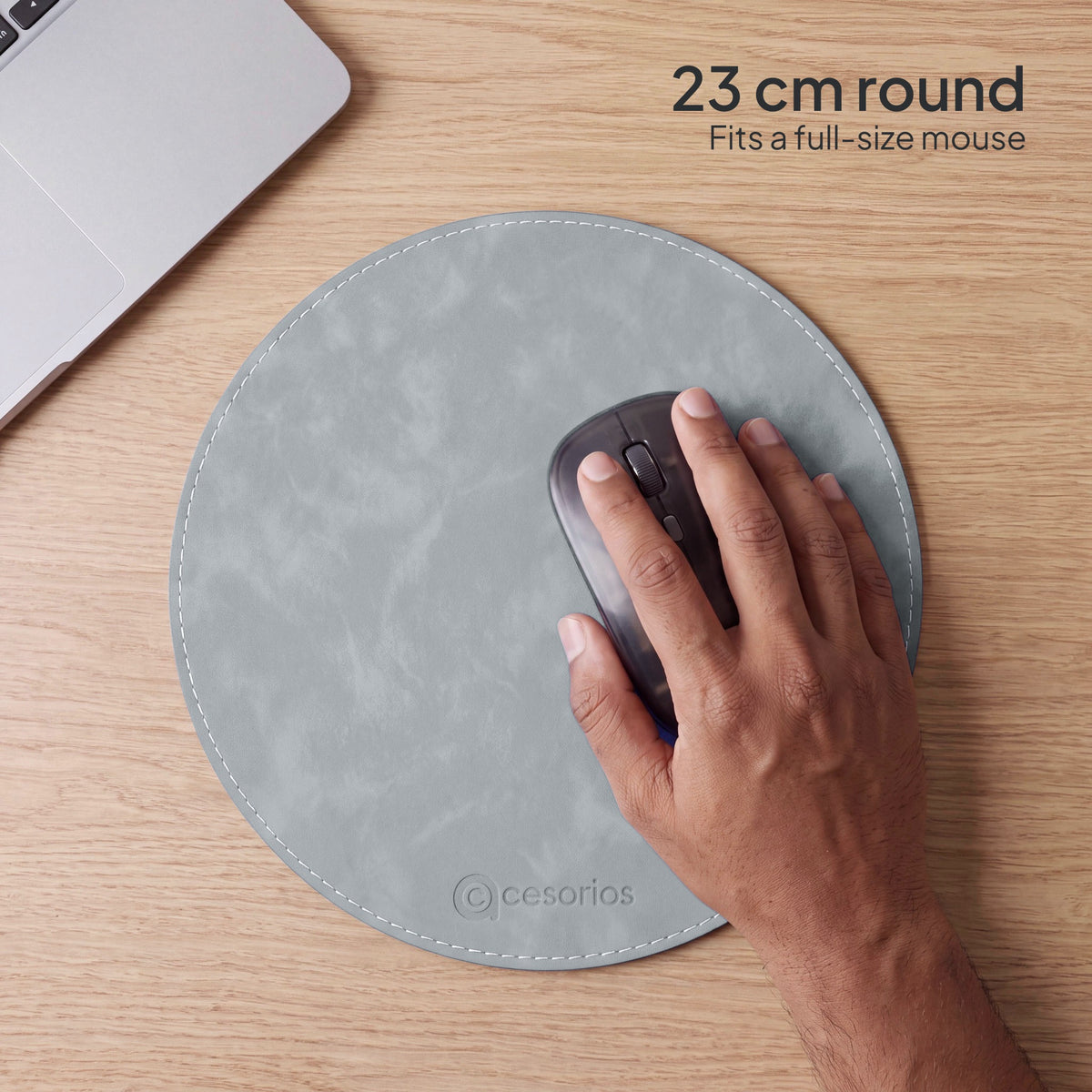 Stone Grey round vegan leather mouse pad 23 cm - hand on mouse showing the 23 cm size